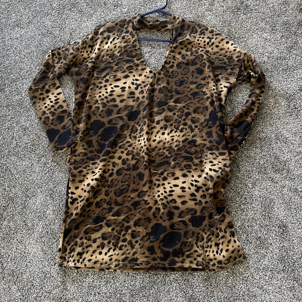 Sexy Leopard Top with cutout in front and back.